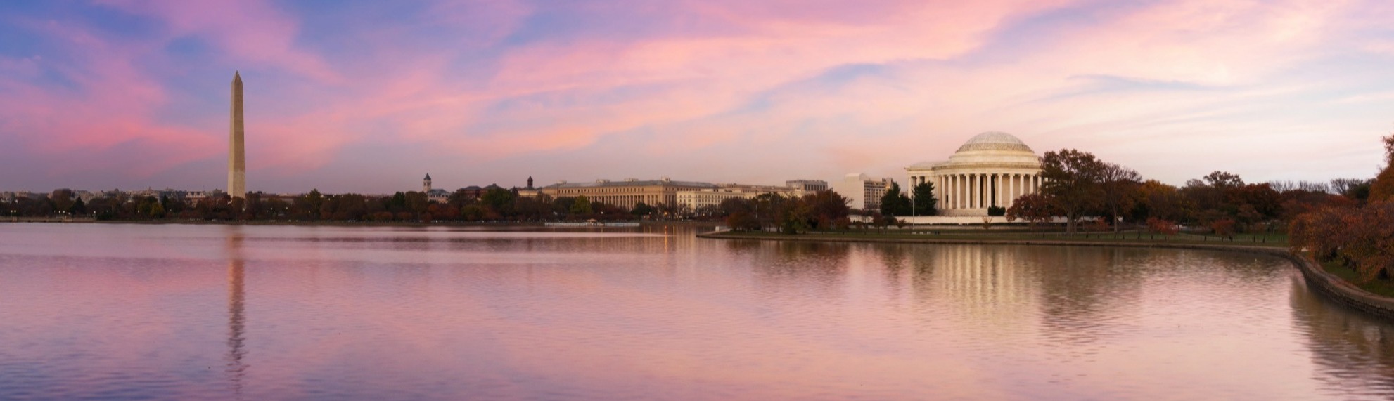 View across the water of the US Capitol Building and Washington Memorial
